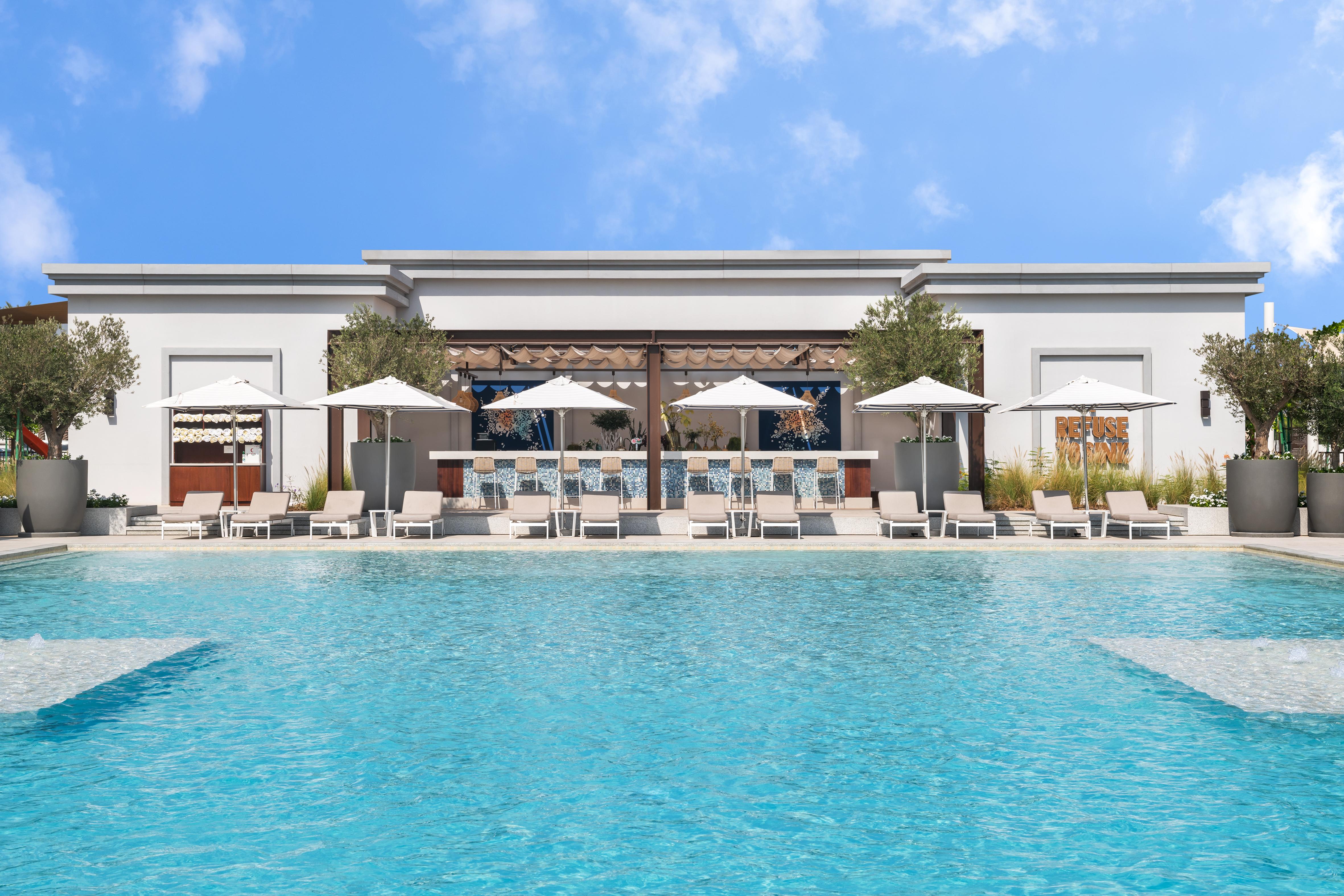 Vida Beach Resort Umm Al Quwain Dış mekan fotoğraf The pool at the Four Seasons Hotel
